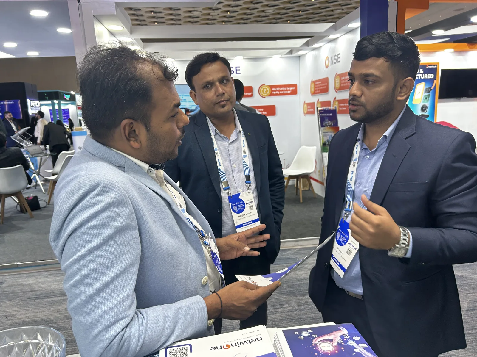 Netwin delegates in conversation with visitors at the GFF booth